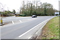 Looking across the A30 to the entrance to Egham International School