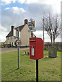 Postbox, village sign and The Crown Inn at Snape