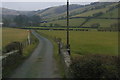 SN9399 : Talerddig: view towards Ystrad from the level crossing by Christopher Hilton