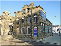 TM5492 : Lowestoft Railway Station boarded up and looking derelict by Adrian S Pye
