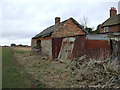 Cottage outbuildings near Langholme Manor