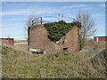 Brick and concrete clad WW2 fuel tanks