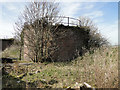 Brick and concrete clad WW2 fuel tanks