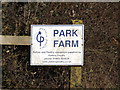 TM1977 : Park Farm sign by Geographer