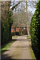 Looking along Woodland Close to house