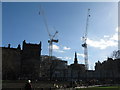 NT2574 : Cranes on the BCCI building site by M J Richardson