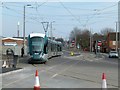 SK5738 : Tram at Meadows Way junction by Alan Murray-Rust