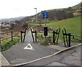 Inward sloping path barriers at the edge of Protheroe Street, Caerau