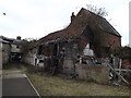 TM3863 : Path to the B1121 High Street & Derelict Business Premises by Geographer