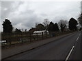 TM2972 : Allotments & the B1117 Station Road by Geographer