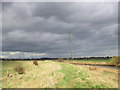 The River Hull, pylons and threatening sky