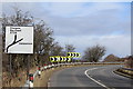 NS4255 : A736 Lochlibo Road near Uplawmoor by Leslie Barrie