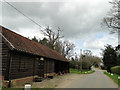 Old farm building and cartshed opposite Old Rookery House