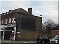 Ghost sign on the corner of Rogers Road, Tooting