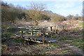 SJ8050 : Audley: Leddy's Field: wooden footbridge by Jonathan Hutchins