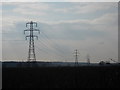 TF1304 : Pylons off Woodcroft Road near Marholm by Paul Bryan