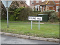 TM0667 : Pound Hill sign by Geographer