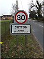 TM0668 : Cotton Village Name sign by Geographer