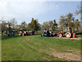 Tractors in an old orchard