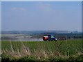 SU4880 : Tractor spreading chemicals on crop by Bikeboy