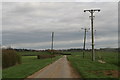 Cables across Castle Lane and a public footpath along it