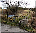 Stile to a track through a colliery tip restoration site, Caerau