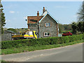 Flint and brick house by the crossroads in Knettishall