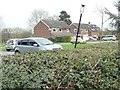 Parked cars and houses in Ramsey Close