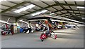 NZ1798 : Microlight aircraft in hangar by Russel Wills