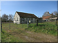 Disused building by Cornells Lane