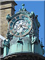 NZ2464 : Clock on Emerson Chambers, Blackett Street, NE1 by Mike Quinn