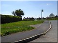 Bus stop on A465 with Moorfield Cottages beyond