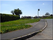 SO5846 : Bus stop on A465 with Moorfield Cottages beyond by David Smith