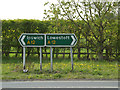 TM3865 : Roadsigns on the A12 Main Road by Geographer
