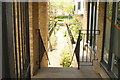 View down the steps to the Lea towpath from Mill Bridge