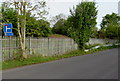 Signs at a railway perimeter fence, Station Road, Little Stoke