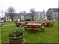 Picnic tables on Tomintoul Square