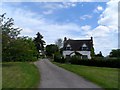 Cottage fenced-off by builders