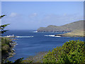 V4078 : Fort Point Lighthouse, Beginish Island and Doulus Head by Martin Southwood