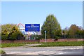 Cycle and foot path by A5 and sign for restaurant