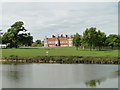 Helmingham Hall across the lake