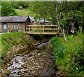 Wooden footbridge over Valley Brook in Newland