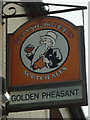 Sign for the former Golden Pheasant, Cliburn