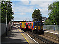 Egham station: passing trains