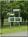 TM1080 : Roadsigns on the A1066 High Road by Geographer