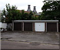 Four lockup garages and two old brewery chimneys in Romney