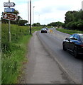 Three signs pointing right across Southampton Road, Romsey