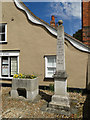 Mile Post and horse drinking trough