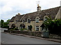 Row of Cotswold stone houses in Kemble