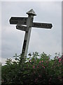 The  signpost  at  Potters  Elm